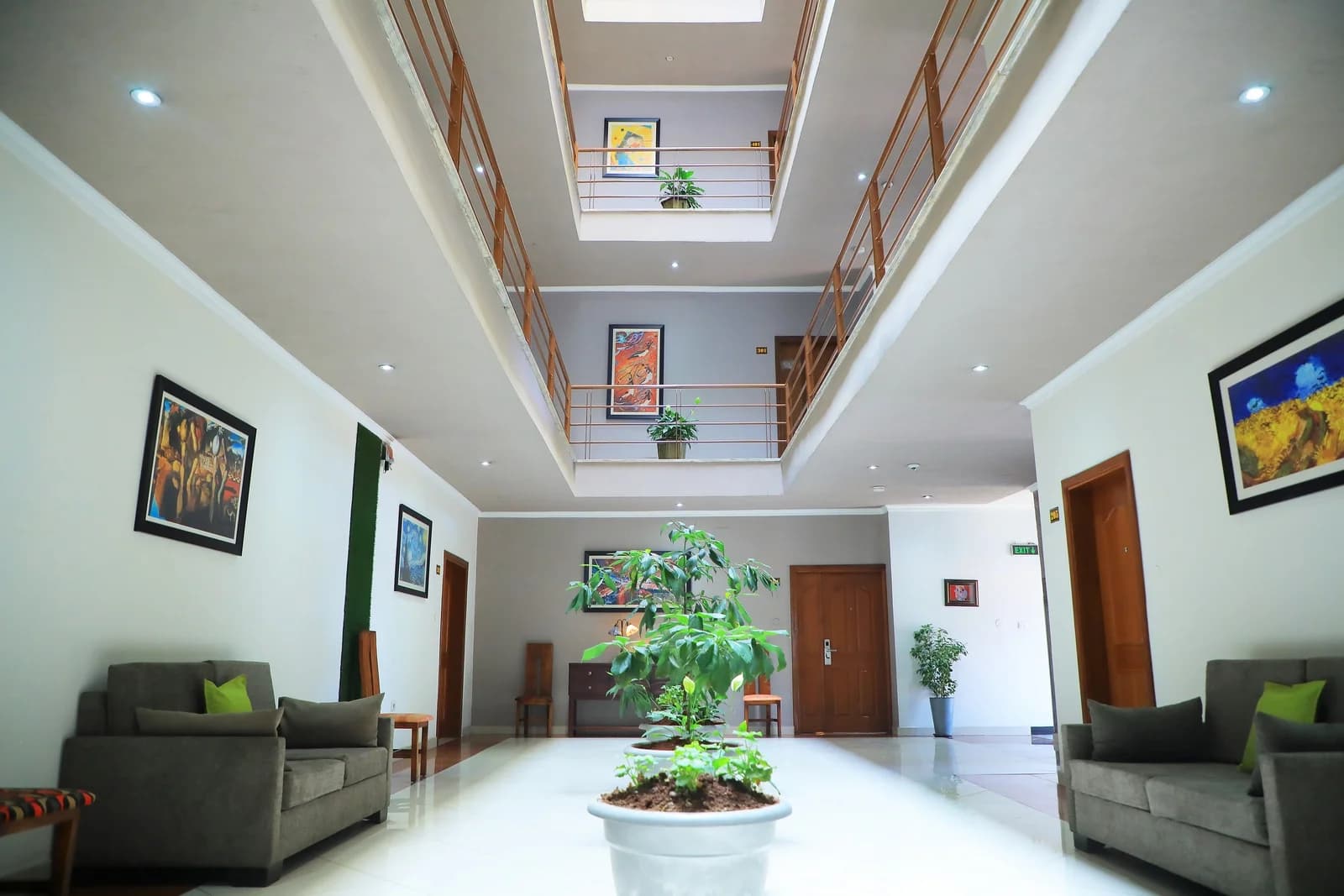 Victoria Hotel atrium with natural light and artwork